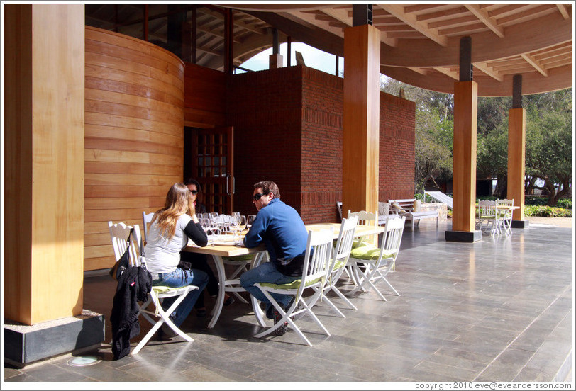 Picnic tables outside tasting room.  Emiliana Vineyards.