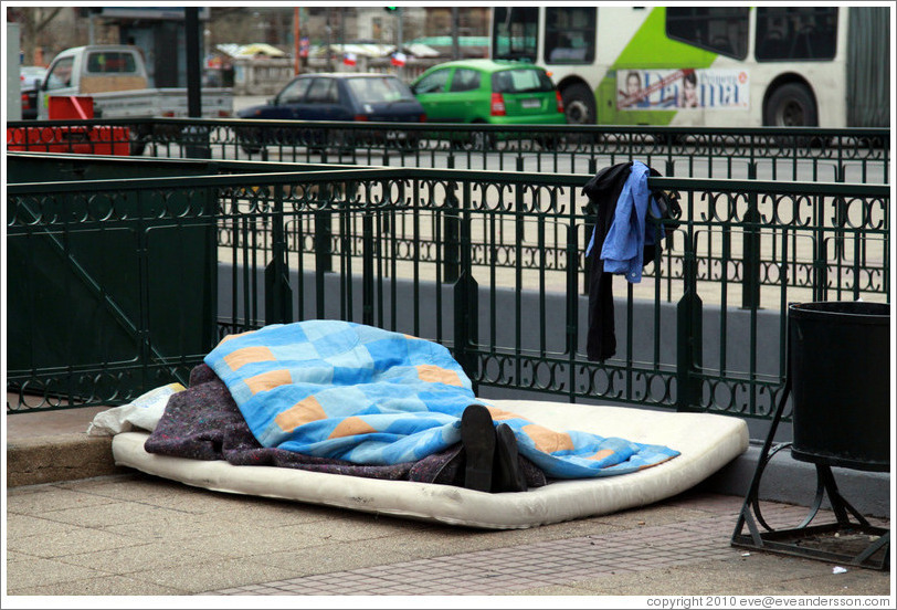 Homeless person, Plaza Oscar Castro.