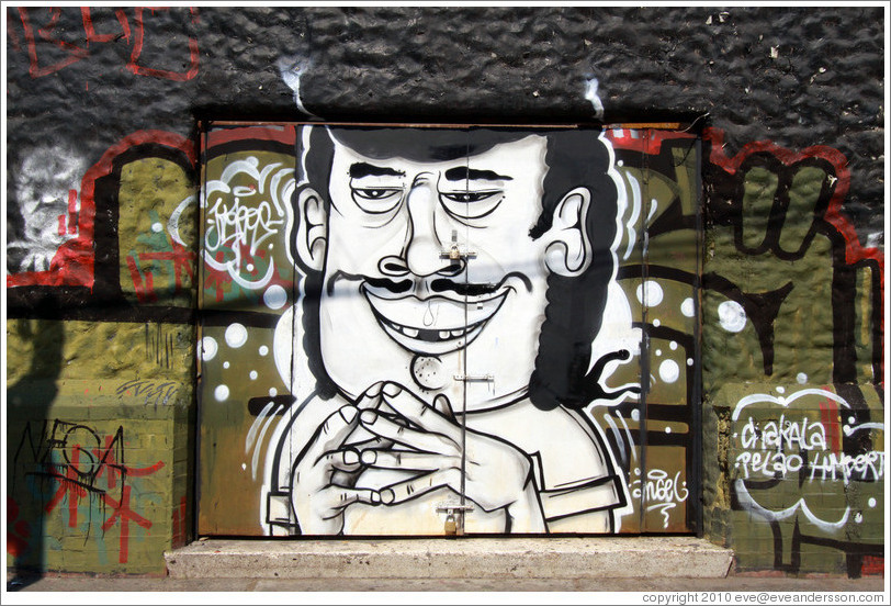 Graffiti: scheming man.  Antonia L? de Bello, Bellavista neighborhood.