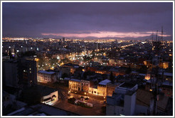 View of Santiago at dusk from the RQ Santiago Suites hotel.