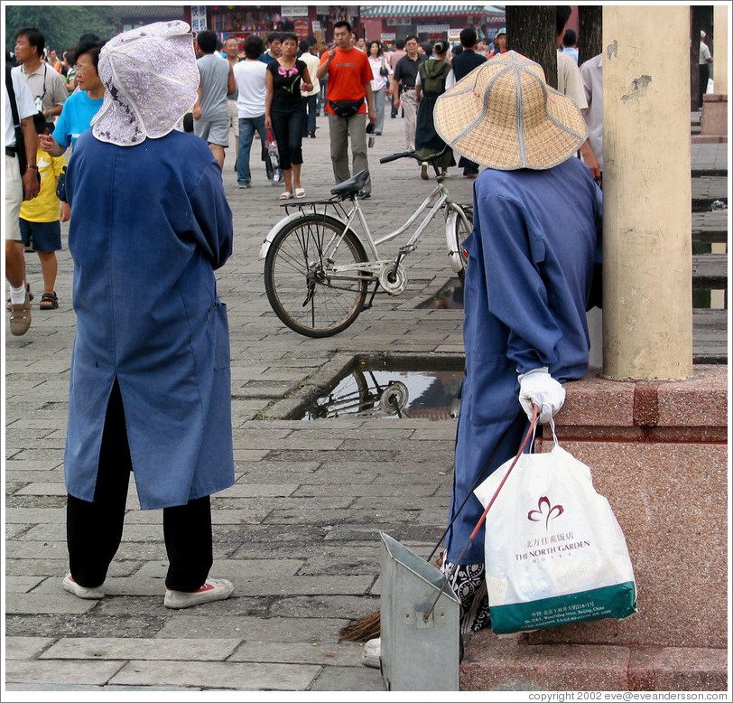 Cleaners at Forbidden City.