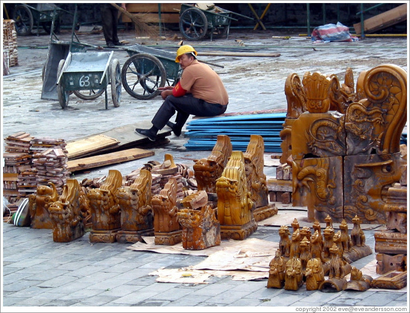 Construction worker at Forbidden City.