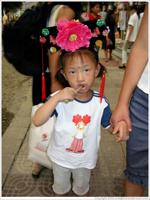 Girl with headdress.