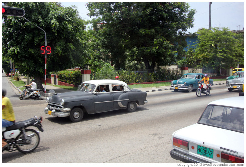 Grey and white car, 31st Avenue.