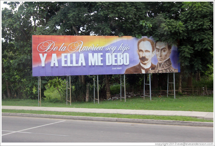 Billboard with quote from Jos&eacute; Mart&iacute;: "De la Am&eacute;rica soy hijo, y a ella me debo" ("I am a son of America, and am indebted to her").