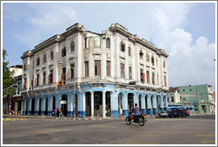 Building that appears to have had a bite taken from the top of it, Avenida Salvador Allende (Carlos III).