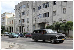 Dark grey car, corner of 25th Street and L Street.