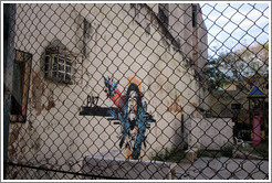 Playground, with a picture of Che Guevara and the words "Paz" ("Peace") and "Justicia para todos" ("Justice for all").