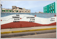 A timeline of the revolution, including Faro Tr&iacute;ngulo and Cayo Arenas, painted on a wall at O Street and Humbolt.