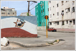 A UJC (Young Communist League) logo, with the words "Estudio" ("Study"), "Trabajo" ("Work"), and "Fusil" ("Rifle"), painted on a wall at O Street and Humbolt.