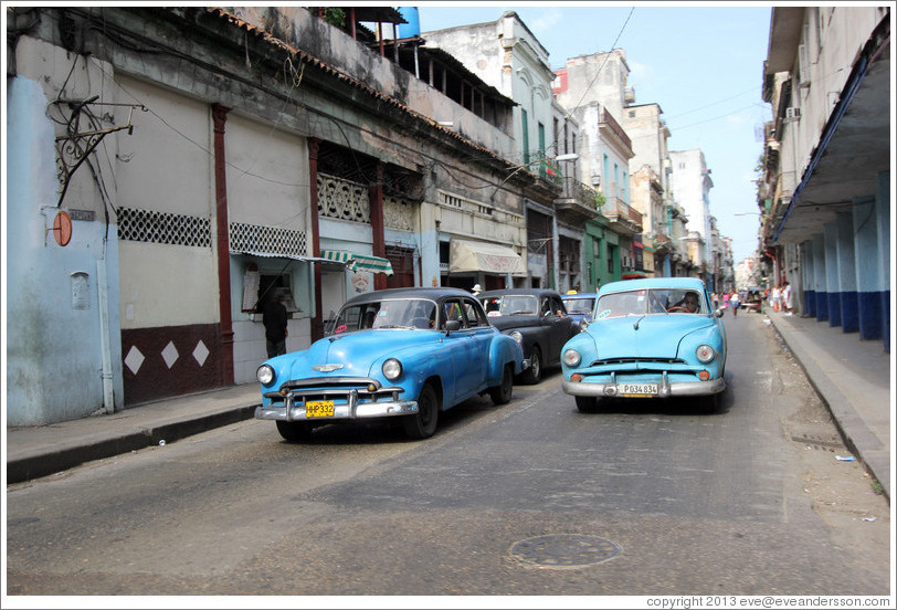 Two blue cars, Calle Padre Varela (Belonscoain).