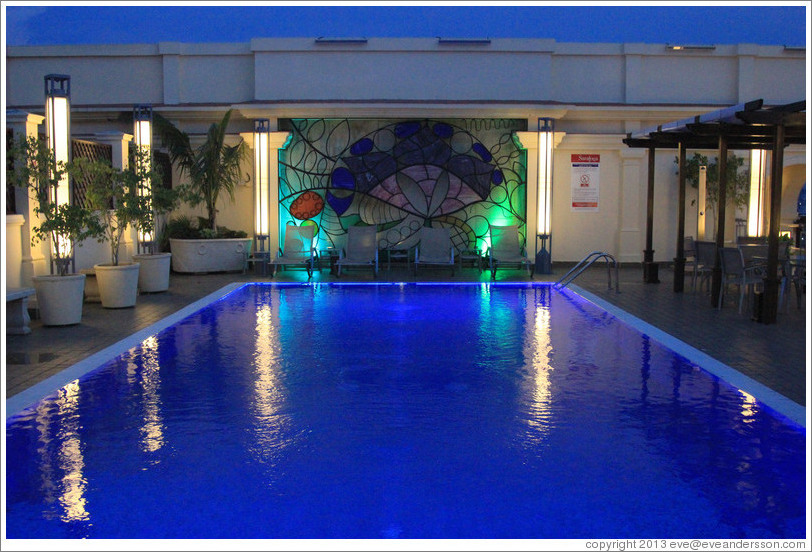 Rooftop swimming pool at dusk, Hotel Saratoga.