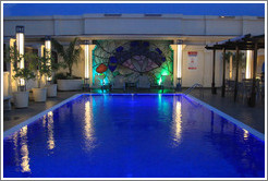 Rooftop swimming pool at dusk, Hotel Saratoga.