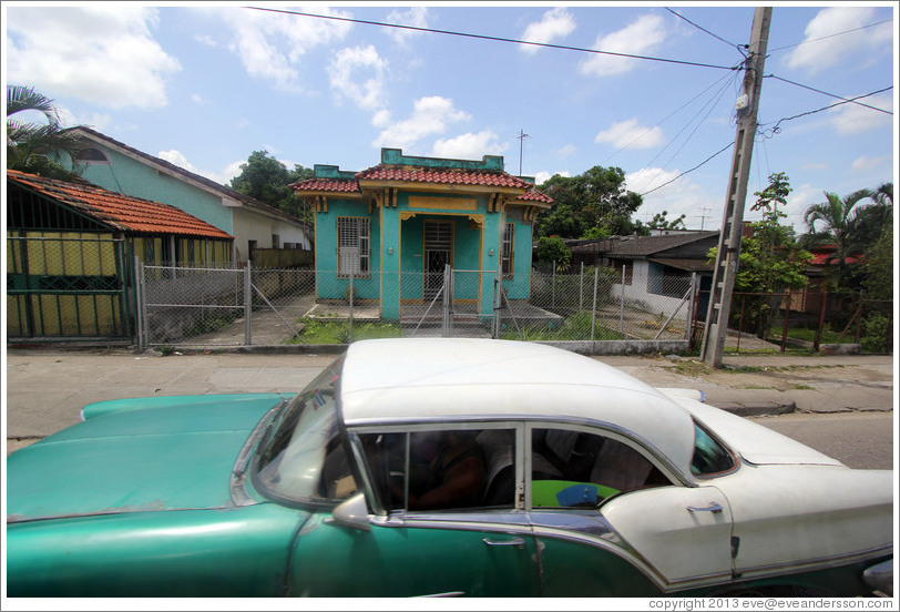 Aqua house and green and white car, Calle Perla, La V&iacute;bora neighborhood.