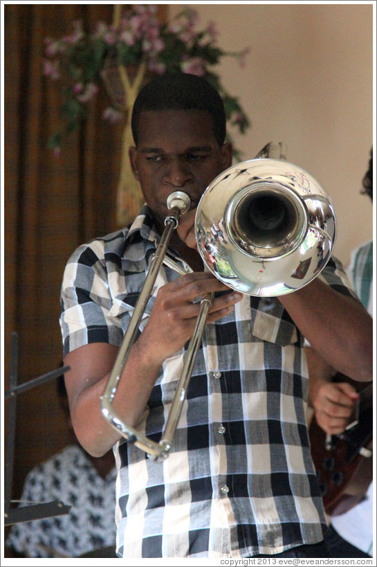 Trombonist Eduardo Sandoval, performing at a private home in Miramar.