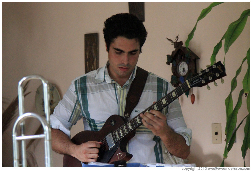 Guitarist Hector Quintana, performing at a private home in Miramar.