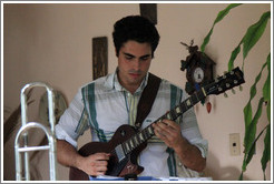 Guitarist Hector Quintana, performing at a private home in Miramar.