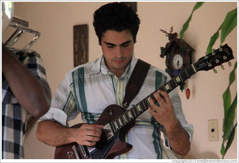 Guitarist Hector Quintana, performing at a private home in Miramar.