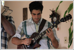 Guitarist Hector Quintana, performing at a private home in Miramar.