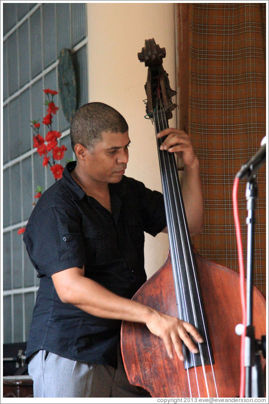 Double bassist Omar Gonzales, performing at a private home in Miramar.