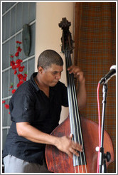 Double bassist Omar Gonzales, performing at a private home in Miramar.