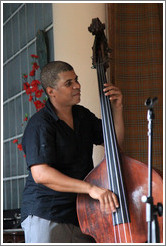 Double bassist Omar Gonzales, performing at a private home in Miramar.