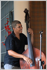 Double bassist Omar Gonzales, performing at a private home in Miramar.