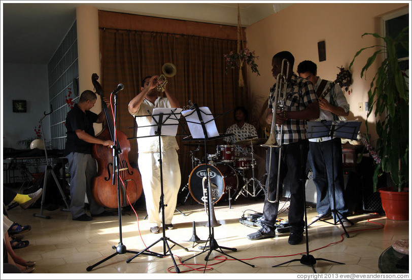 Musicians (Omar Gonzales, Yasek Manzano Silva, Julio Silva, Eduardo Sandoval, Hector Quintana) performing at a private home in Miramar.