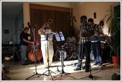 Musicians (Omar Gonzales, Yasek Manzano Silva, Julio Silva, Eduardo Sandoval, Hector Quintana) performing at a private home in Miramar.