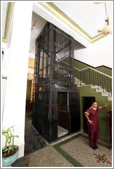 Bellhop by the elevator, Hotel Ambos Mundos, Old Havana.
