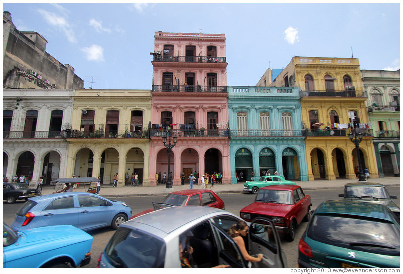 Colorful buildings and cars, Paseo del Prado.