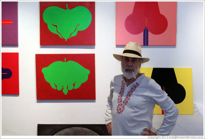 Cuban artist Juan Moreira in front of his artwork in the studio he shares with Alicia Leal.