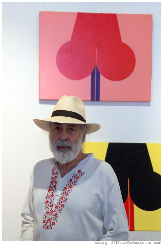 Cuban artist Juan Moreira in front of his artwork in the studio he shares with Alicia Leal.