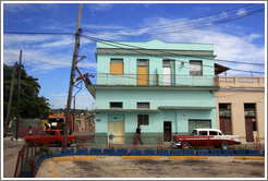 Green house and red car, 272nd Street.