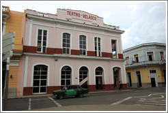 Green car in front of Teatro Velasco near Parque de la Libertad (Liberty Park).