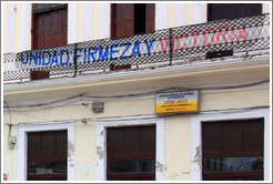 Banner reading, "Unidad, firmeza y victoria" ("Unity, firmness, and victory") near Parque de la Libertad (Liberty Park).