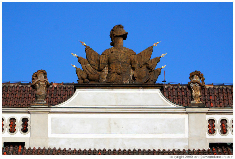 Building detail, with helmet and flags, 1st Courtyard, Prague Castle.