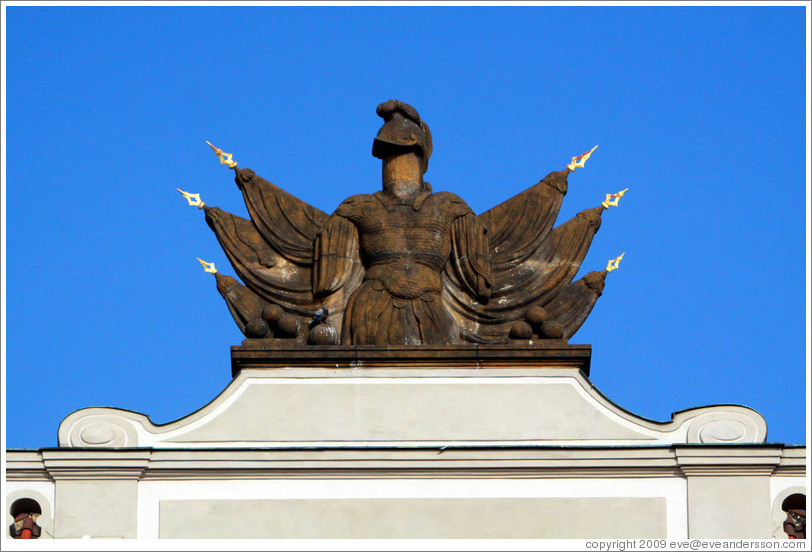 Building detail, with helmet and flags, 1st Courtyard, Prague Castle.