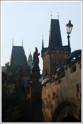 Sculpture of a bishop making a peace-sign (or similar hand gesture), Charles Bridge (Karl&#367;v most), viewed from Kampa.