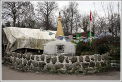 Structure with stone wall.