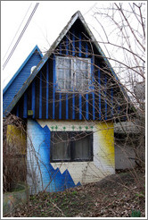 House with marijuana leaves painted on it.