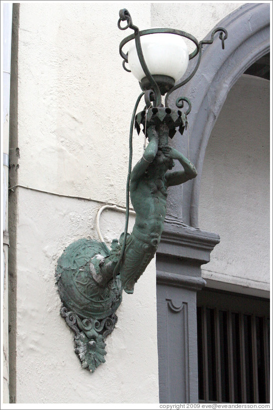 Merman-like light fixture.  Bredgade, Frederiksstaden district, city centre.