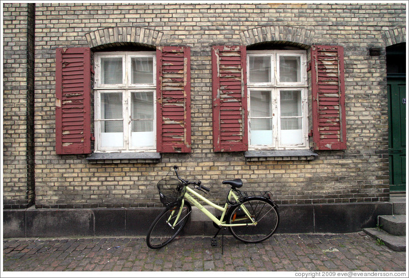 Brick house with red shutters.  Near Sankt Pauls Kirke, city centre.