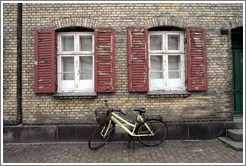 Brick house with red shutters.  Near Sankt Pauls Kirke, city centre.