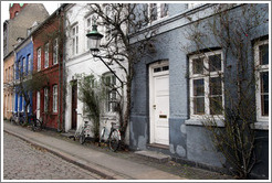 Row of houses: yellow, blue, brown, white, and grey.  Near Sankt Pauls Kirke, city centre.