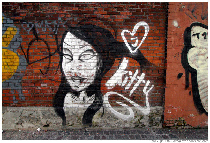 Graffiti: girl and the name "Kitty".  On or near Gothersgade, city centre.
