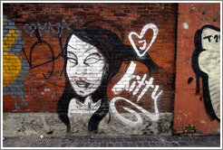 Graffiti: girl and the name "Kitty".  On or near Gothersgade, city centre.