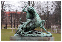 Kamp med en slange, a statue by Thomas Brock.  Portrays a Native American attempting to spear a snake that has wrapped itself around his horse.  Kongens Have (King's Gardens).