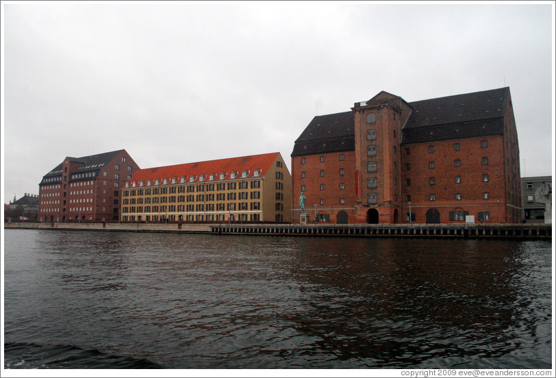 Vestindisk Pakhus, a restored warehouse overlooking Copenhagen harbour.  In front of it stands a replica of Michelangelo's David.