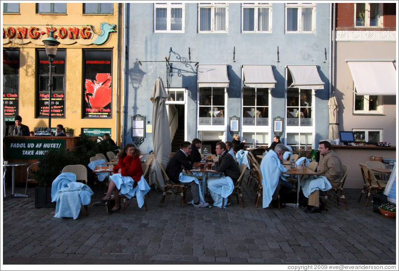 Restaurant with blankets for patrons.  Nyhavn (New Harbor).